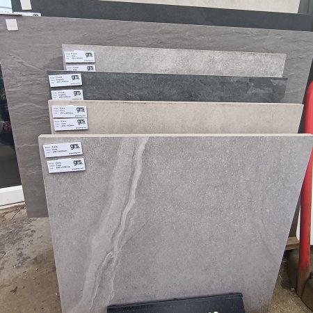 A display of stone paving slabs by grs paving situated outside RP George.