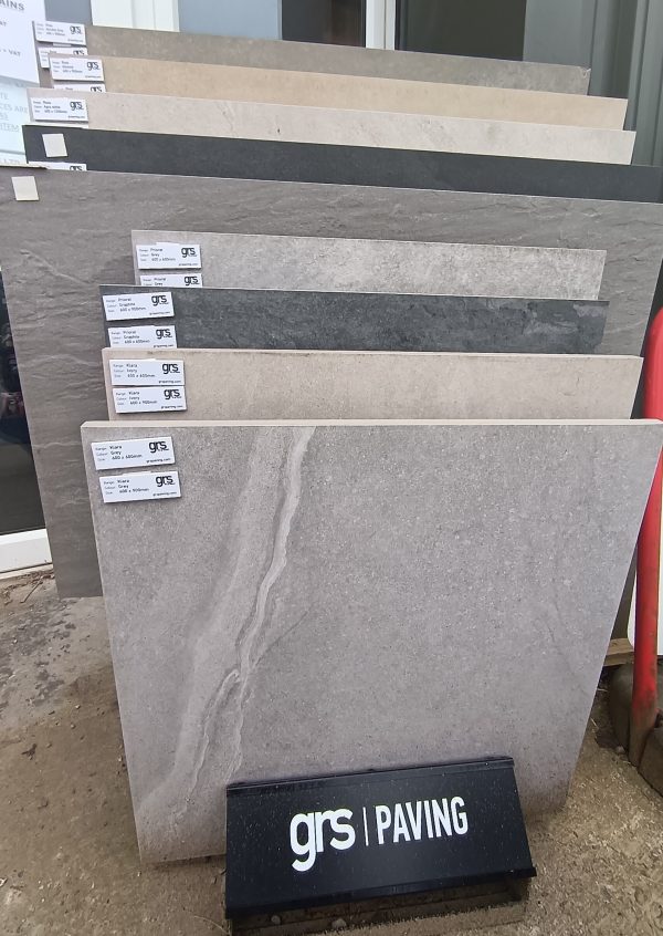 A display of stone paving slabs by grs paving situated outside RP George.