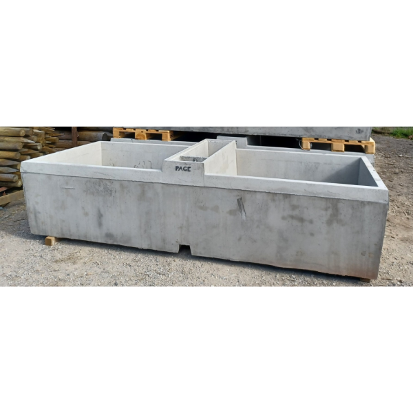 Page concrete water trough in the yard at RP George